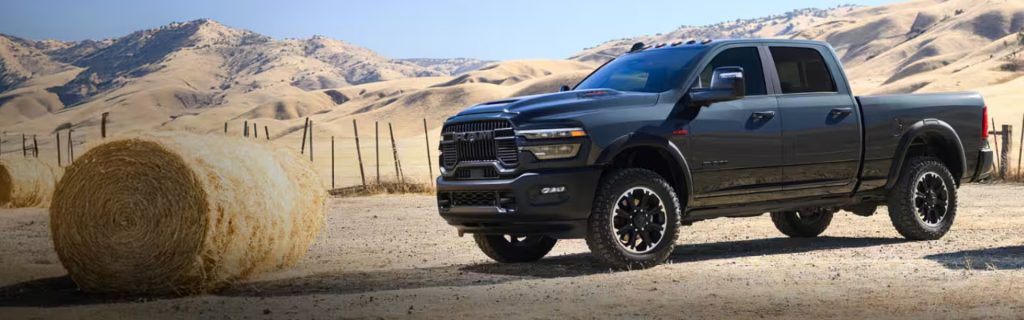 Ram 2500 standing in a desert area showcasing its heavy duty truck feature.