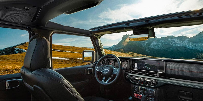 Jeep Wrangler 4xe interior rooftop view with sleek design and scenic view