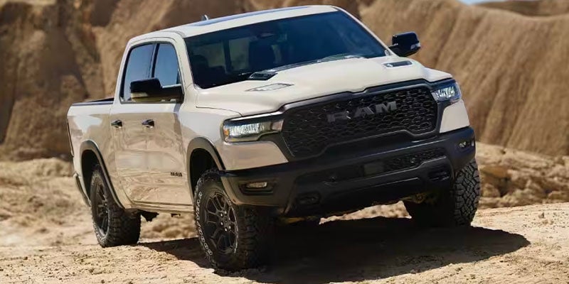 RAM 1500 pickup truck off-roading in a desert terrain